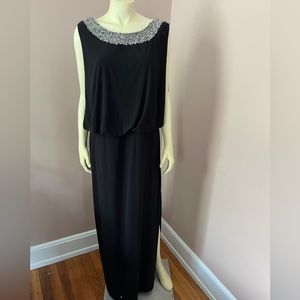 Black evening dress with beaded neck and open back detail